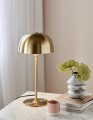 Złota lampa stołowa w stylu skandynawskim Cera z metalu NORDLUX